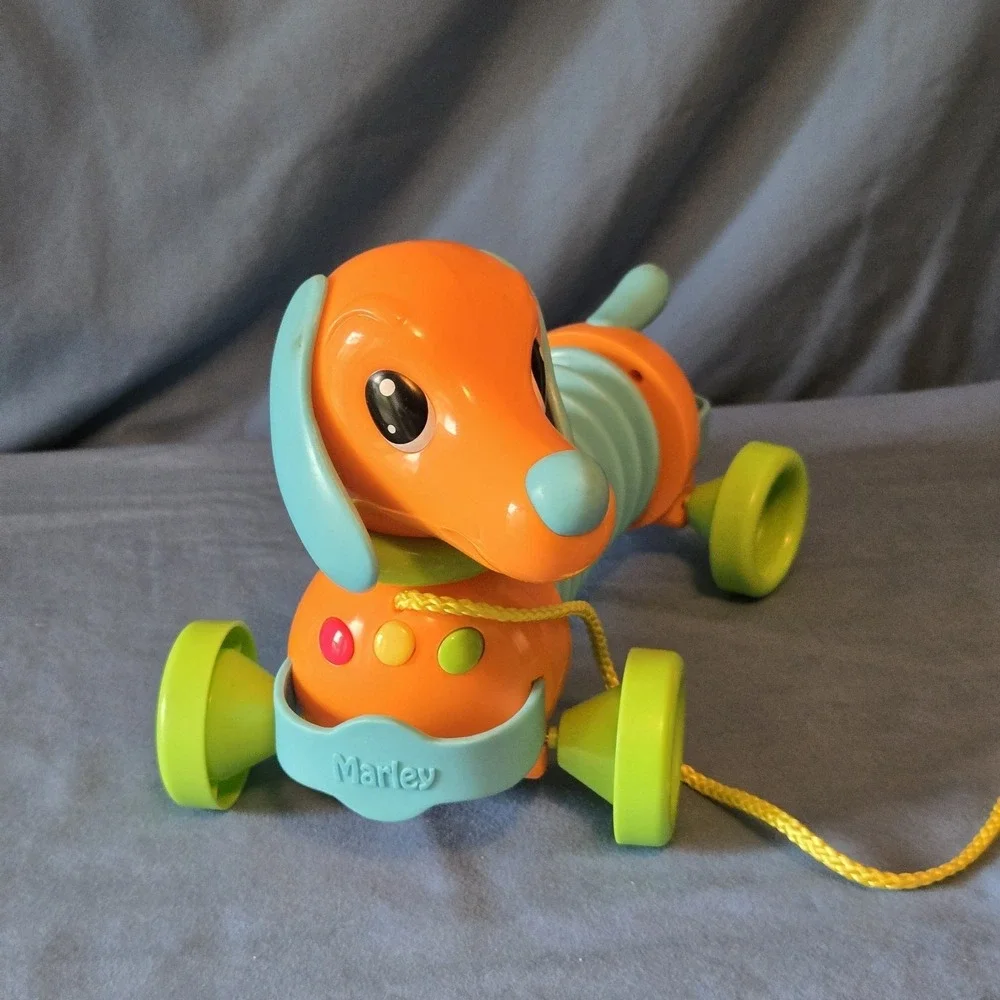 Tomy's  Marley The Musical Dog Plastic Pull Toy For Children 18M+